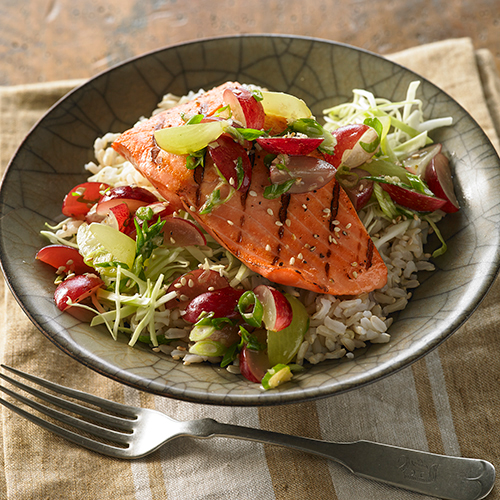 Grilled ginger salmon rice bowl with grapes
